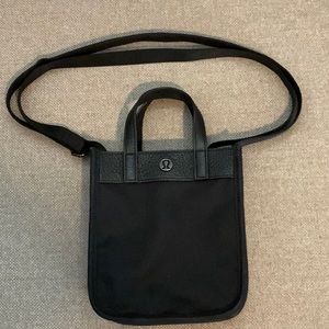 LULULEMON Shoulder strap/handheld purse, black cloth w/ leather trim. 7x6.5x2.5